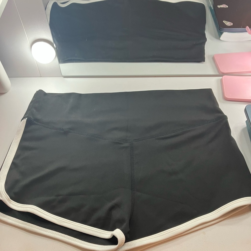 Sleek Black Athletic Shorts with White Trim